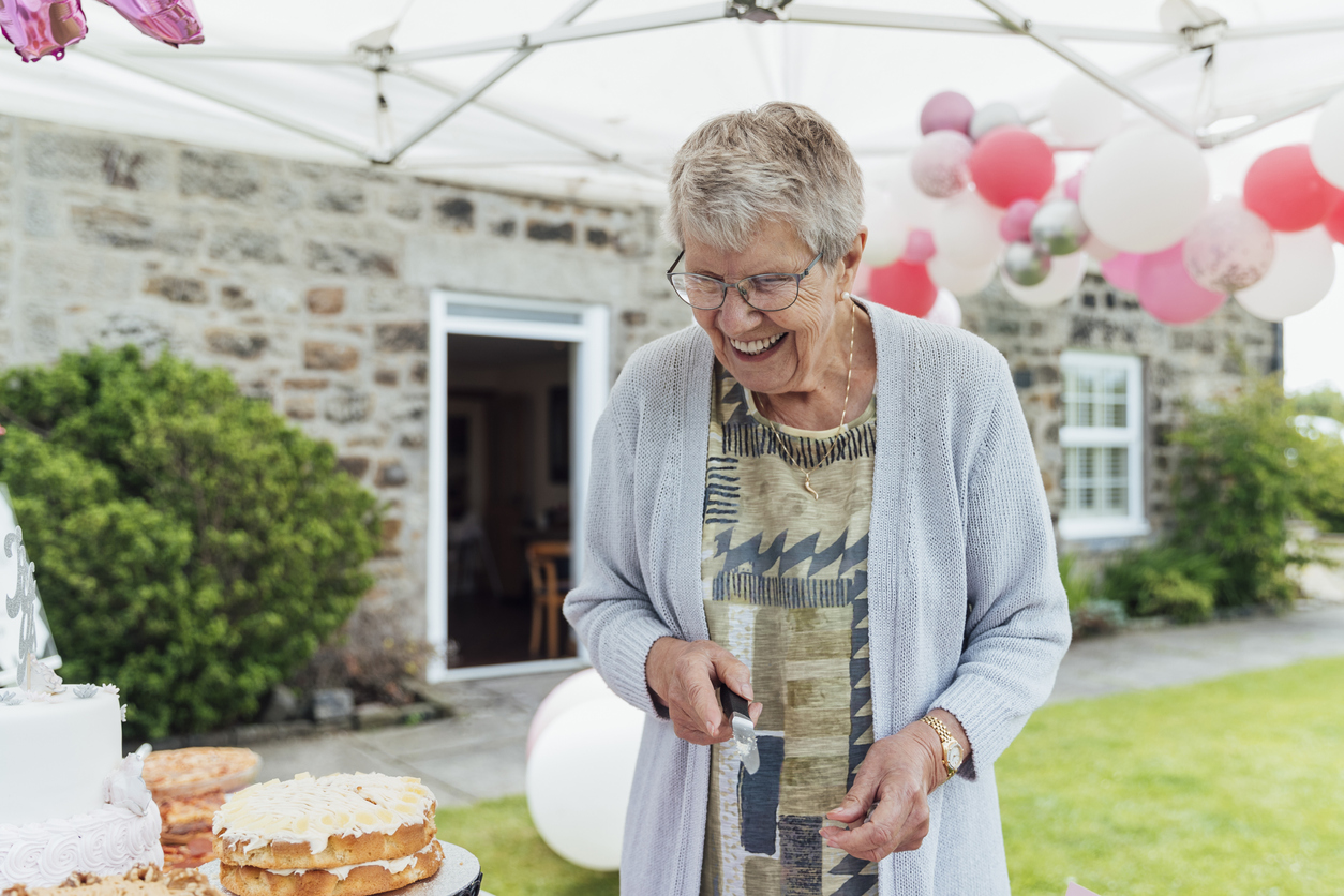 https://turnaround-solutions.com/wp-content/uploads/2021/12/Elderly-Woman-at-Party.jpg
